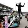 Mercedes driver George Russell celebrates his victory in the Brazilian Formula One Grand Prix at the Interlagos race track in Sao Paulo on Sunday. (AP)