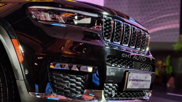 Jeep Grand Cherokee SUV sports black accents around the lower air intake and fog lamps. Jeep Grand Cherokee SUV sports black accents around the lower air intake and fog lamps.