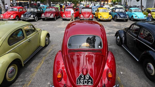 The Volkswagen Beetle Owners Club of Sri Lanka displays members' cars during an event in Colombo.