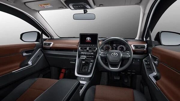 The dual-tone interior is dominated by a giant floating digital touchscreen unit placed on top of a vertical shaped centre console housing other functions like climate control and gearbox unit. There is also a digital driver display. The hybrid version of the MPV offers EV mode as one of the drive modes. The dual-tone interior is dominated by a giant floating digital touchscreen unit placed on top of a vertical shaped centre console housing other functions like climate control and gearbox unit. There is also a digital driver display. The hybrid version of the MPV offers EV mode as one of the drive modes.