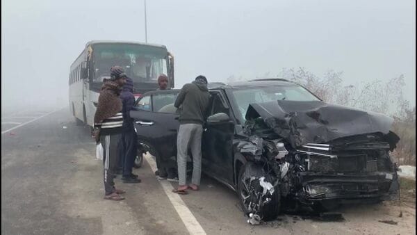 One of the cars involved in a multi-car pile-up due to dense fog on Monday morning near Hapur in which several people were injured.