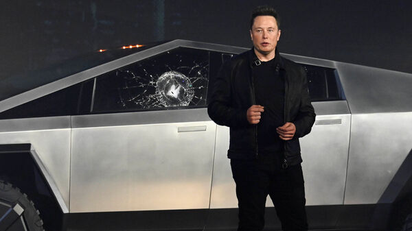 File photo of Tesla CEO Elon Musk unveiling the Cybertruck in 2019. The highly anticipated futuristic electric pickup still hasn't hit the production line three years after it was shown to the world.  (Reuters)