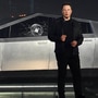 File photo of Tesla CEO Elon Musk unveiling the Cybertruck back in 2019. The much anticipated futuristic electric pickup truck is yet to hit production lines three years after it was showcased to the world. (Reuters)