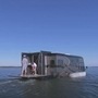 The motorhome takes less than five minutes to go from becoming a road vehicle to a sailing yacht.  (Aquatic Floating RV/YouTube)