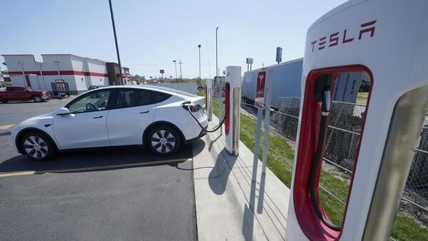 Tesla says it sold a record 1.3 million electric vehicles in 2022. But the number fell short of CEO Elon Musk’s pledge to grow the company's sales by 50% nearly every year. (AP)