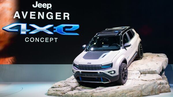 The all-electric Jeep Avenger SUV is on display at the Paris Motor Show. Jeep brand owner Stellantis is likely to close more facilities as the cost of electric vehicle production rises.  (Bloomberg)