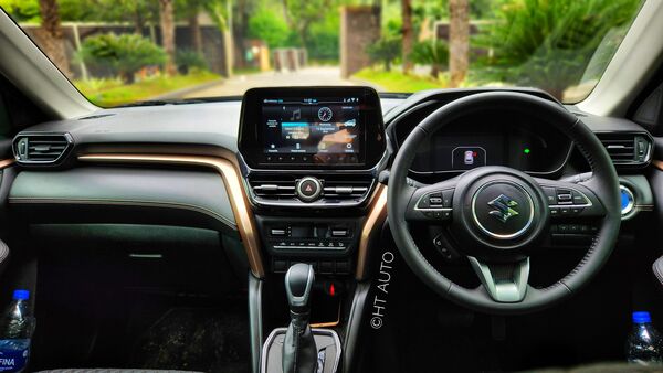 A look at the all-black interiors with Champagne Gold accents on the strong hybrid model of the Grand Vitara.