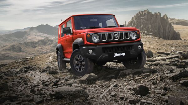 Jimny will be offered in five one-tone colors and two two-tone colors.  Available in Sizzling Red, Granite Grey, Nexa Blue, Nexa Blue, Blue Black and Pear Arctic White.  Then there are two-tone options of Sizzling Red with a bluish Black roof and Kinetic Gold with a bluish Black roof.