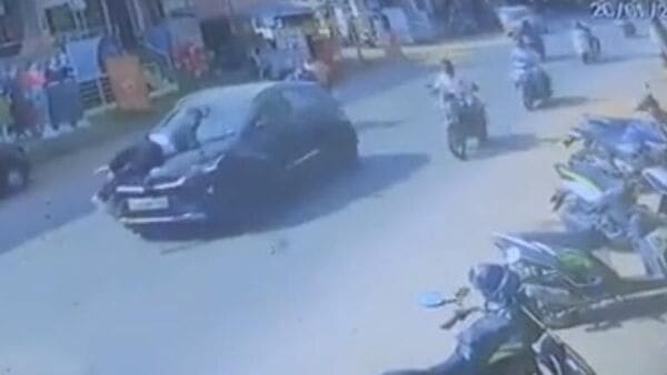 A woman allegedly dragged a man over the bonnet of her Tata Nexon SUV on Friday in Bengaluru's Jnana Bharathi Nagar following an argument.  (HT image) (HT_PRINT)