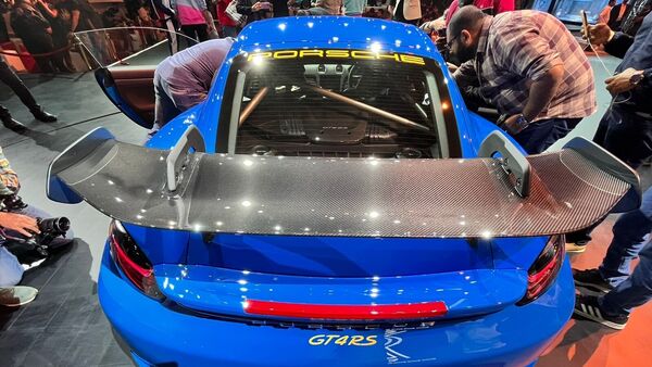 Porsche claims that the 718 Cayman GT4 RS is capable of accelerating from 0-100 kmph in 3.4 seconds and can hit 200 kmph in 10.9 seconds. Porsche claims that the 718 Cayman GT4 RS is capable of accelerating from 0-100 kmph in 3.4 seconds and can hit 200 kmph in 10.9 seconds.