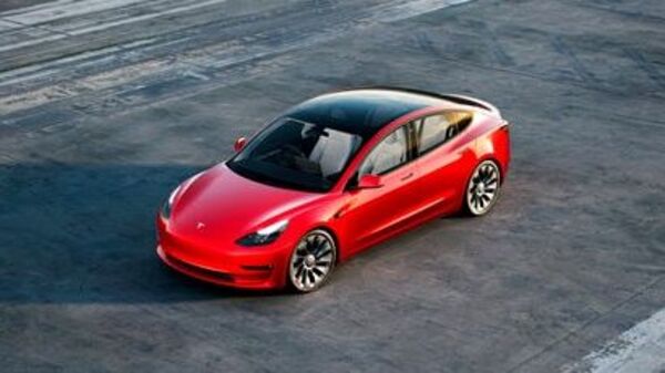 Tesla's goal is to drastically reduce wait times for its popular vehicles, such as the Model 3.  (Associated Press)