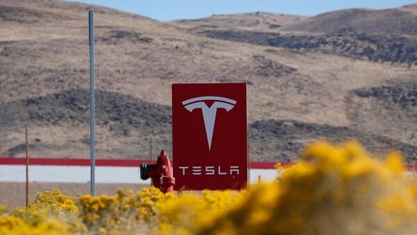 Electric carmaker Tesla is considering building an assembly plant near Mexico City's new airport, Reuters reported.  (Associated Press)