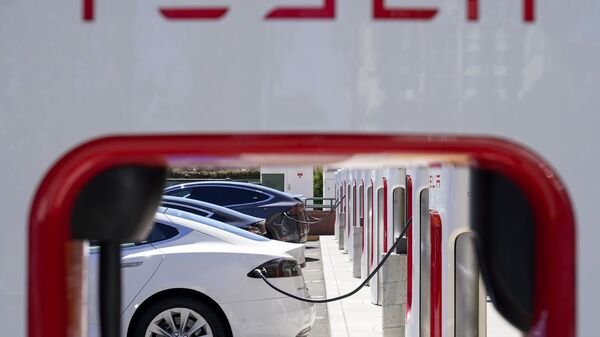 Tesla will, for the first time, offer some charging stations to all U.S. electric vehicles, regardless of make, by the end of next year, under a new plan announced by the White House.  (File photo) (AP)
