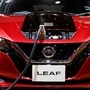 FILE PHOTO: A charging cable is attached to a Nissan Leaf electric car at the Tokyo Motor Show. (REUTERS)