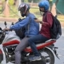 A passenger takes an UberMoto ride in Connaught Place in New Delhi on Monday. The Delhi transport department has issued challans to 25 bike-taxi drivers till Tuesday. (Raj K Raj/HT Photo) (HT_PRINT)