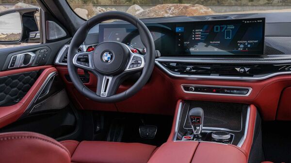 The cabin comes with BMW Curve Display, which combines the infotainment system and instrument cluster into a single bezel. The cabin comes with BMW Curve Display, which combines the infotainment system and instrument cluster into a single bezel.