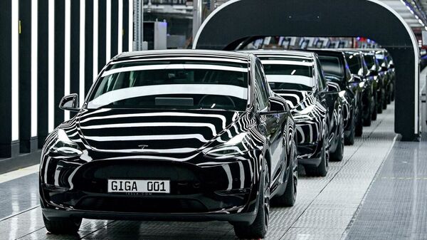 A Tesla electric car can be seen on a production line in Germany.  (Reuters)