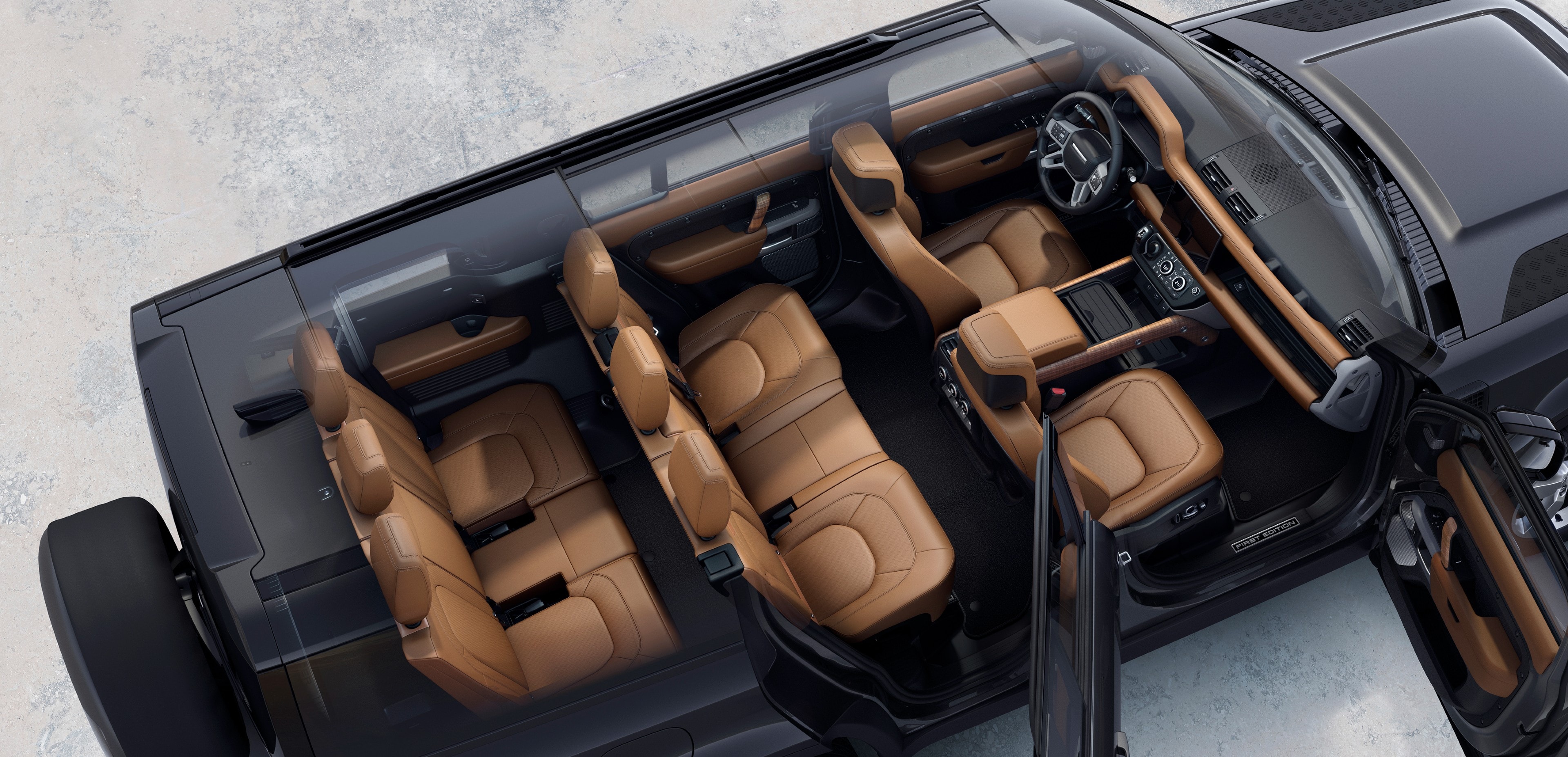 The Land Rover Defender 130 gets stadium-style seats with the second and third row elevated
