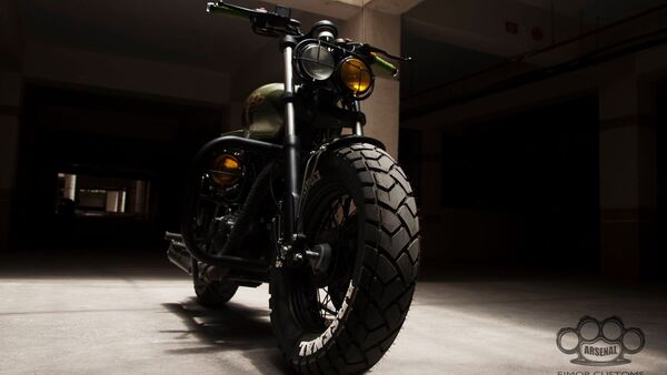 The spoked wheels are wrapped in dual-sport tyres that are wider than the stock units. The spoked wheels are wrapped in dual-sport tyres that are wider than the stock units.