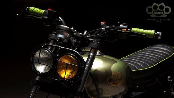 There is an all-new headlamp. It gets two circular units, both of which are finished in different colours. There is also a protective grille on them. There is an all-new headlamp. It gets two circular units, both of which are finished in different colours. There is also a protective grille on them.