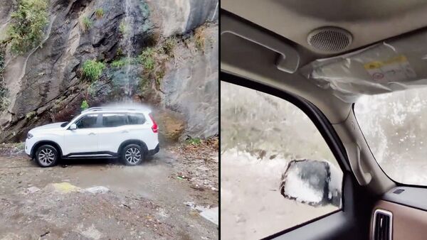 Mahindra y Mahindra respondieron a un video viral de un techo corredizo con fugas de Scorpio-N debajo de una cascada con un video similar.