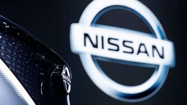 Nissan aims to reduce development and production costs for electric powertrains by 30 percent by 2026.  (Reuters)