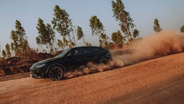 File photo of a Lamborghini Urus Performante driving on a dirt road near Bangalore.