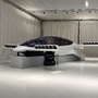 A full-size mock-up of an electrically powered Lilium Jet air taxi is seen in a presentation bay inside a hangar at its headquarters in Oberpfaffenhofen airport outside Munich. (REUTERS)