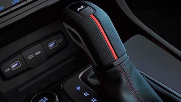 The model gets all-black leather upholstered seats with contrast red stitching. The gear knob also gets red accents and contrast stitching. The model gets all-black leather upholstered seats with contrast red stitching. The gear knob also gets red accents and contrast stitching.