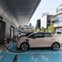 File photo: Ora Good Cat electric vehicles from Great Wall Motor are charged at a company charging station. (Bloomberg)