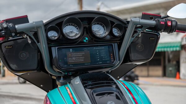The motorcycle looks out worldly, as if it is made for a trip to the galaxy. The motorcycle looks out worldly, as if it is made for a trip to the galaxy.
