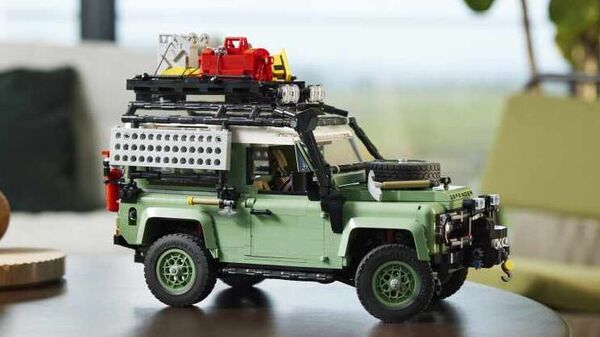 The LEGO Land Rover Defender 90 set has a working steering wheel and suspension.