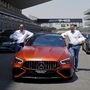 Santosh Iyer, Managing Director and CEO, Mercedes-Benz India and Lance Bennett, VP for Sales and Marketing pose for a photo with Mercedes-AMG-GT 63 S E Performance. (ANI Photo)