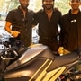 Dulquer Salmaan (centre) with Ultraviolette co-founder Narayan Subramaniam (left) and Niraj Rajmohan (right) 