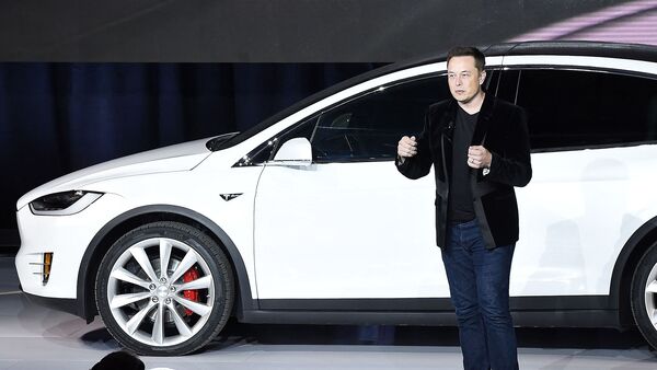 Tesla CEO Elon Musk has hinted that the electric carmaker could sell cars for profit without a dime and still profit from self-driving technology in the future.  (AFP)