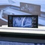 Hyundai's rollable in-car display can be scaled up to two-thirds when using navigation features.