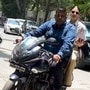 Bollywood actors Amitabh Bachchan and Anushka Sharma were spotted recently riding pillion on motorcycles without wearing helmet, a punishable offence under Motor Vehicles Act.