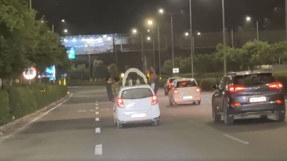 Watch: Man dances, does push-ups on top of moving car; owner arrested ...