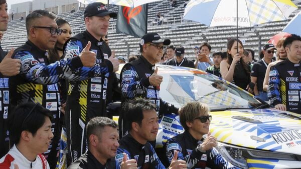 The Toyota team celebrates their successful event at the Fuji Speedway, marking a significant milestone in their pursuit of hydrogen-powered vehicles. (AP)