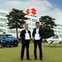 Suzuki Executive General Manager Hidetoshi Kumashiro (left) with Tomohiro Fukuzawa, CEO of SkyDrive.