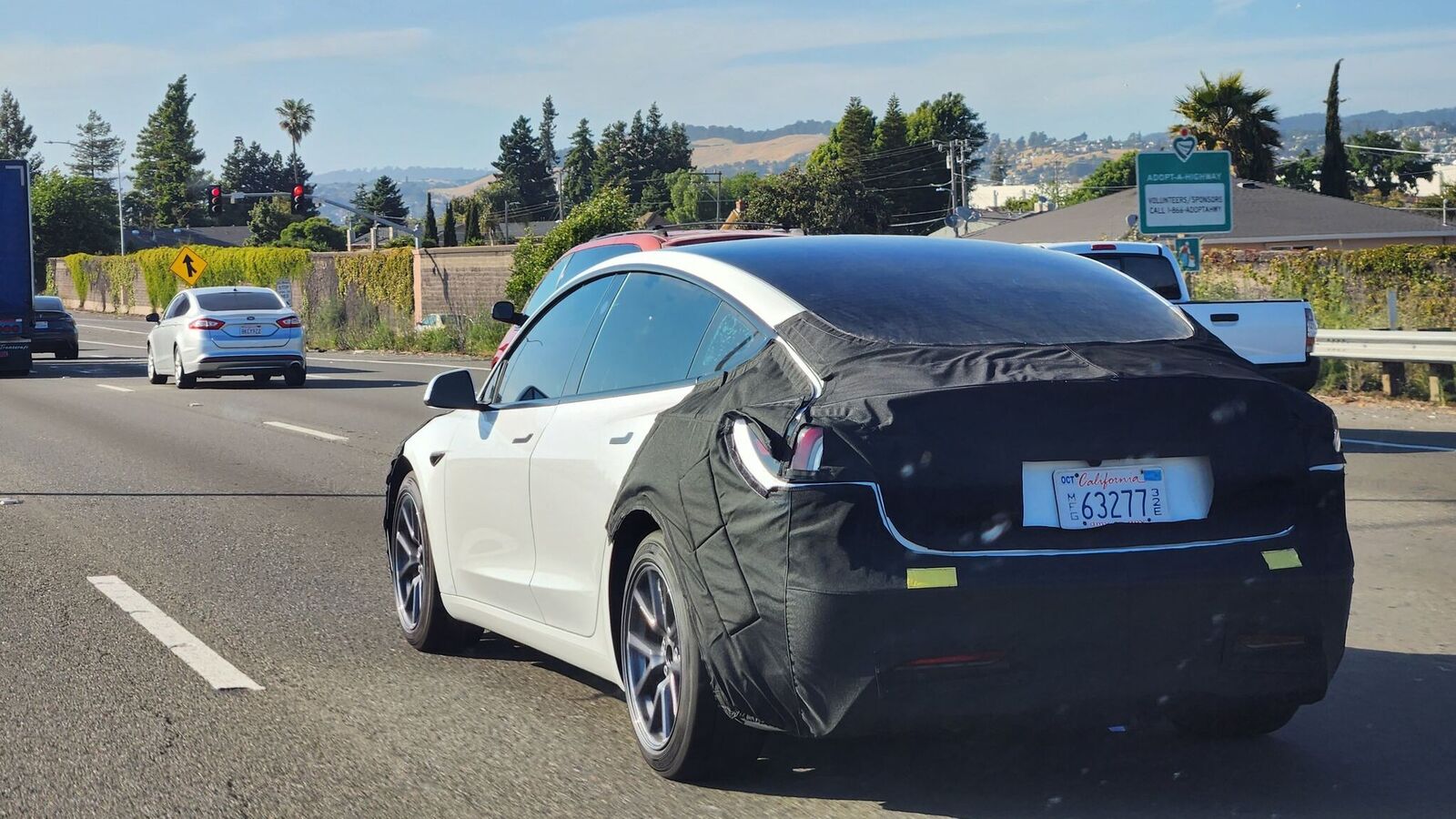 Tesla Model 3 facelift's redesigned taillights revealed partly