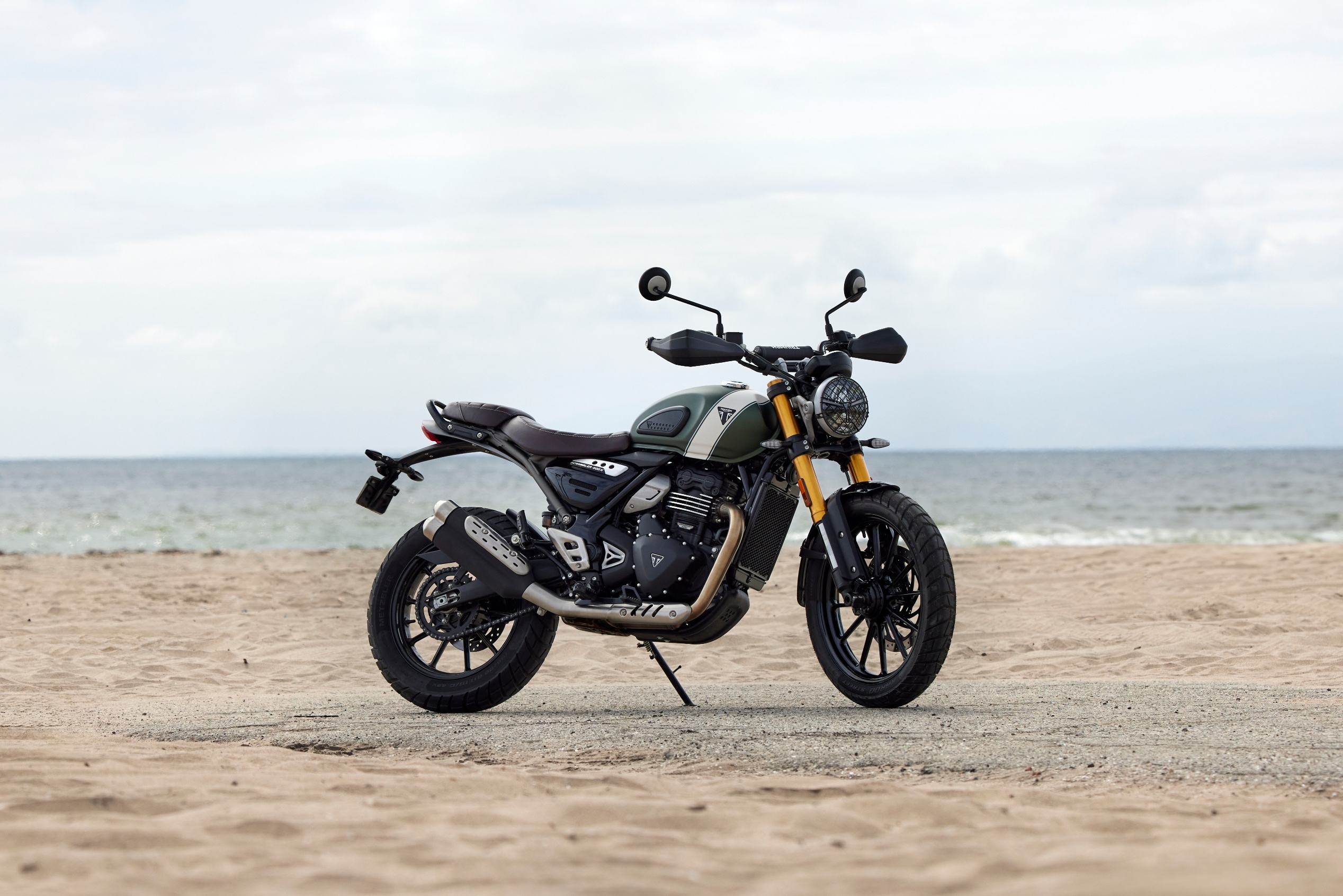 The Triumph Scrambler 400 X gets a longer wheelbase, longer travel suspension, and larger 19-inch front wheel, along with wider handlebars The Triumph Scrambler 400 X gets a longer wheelbase, longer travel suspension, and larger 19-inch front wheel, along with wider handlebars