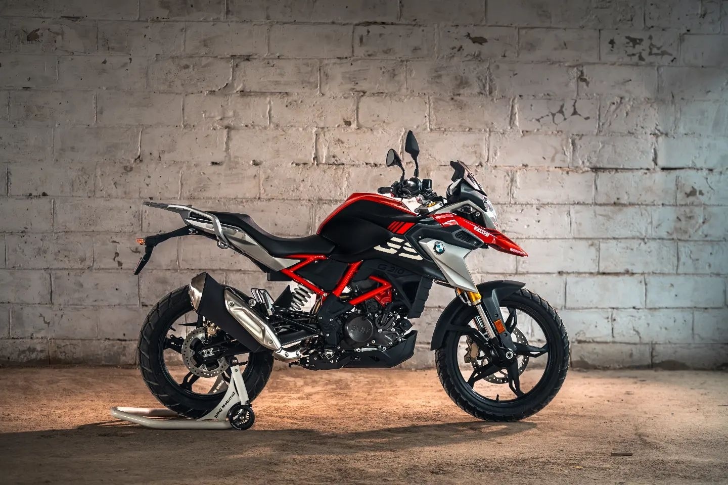 The 2024 BMW G 310 GS gets the feisty Rally paint scheme finished red, black and grey 