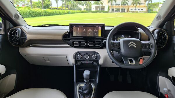 The dashboard and overall cabin layout inside the C3 Aircross is not meant to dazzle potential buyers. But that is not to say that it is not pleasent enough. A large infotianment screen in the middle, all-digital driver display, steering-mounted controls and plenty of sotrage spaces lend the vehicle a practical trait. Hard plastics have been used quite a lot and were perhaps expected. But the feature list itself isn't quite extensive and for someone looking for a sunroof, look elsewhere. The dashboard and overall cabin layout inside the C3 Aircross is not meant to dazzle potential buyers. But that is not to say that it is not pleasent enough. A large infotianment screen in the middle, all-digital driver display, steering-mounted controls and plenty of sotrage spaces lend the vehicle a practical trait. Hard plastics have been used quite a lot and were perhaps expected. But the feature list itself isn't quite extensive and for someone looking for a sunroof, look elsewhere.