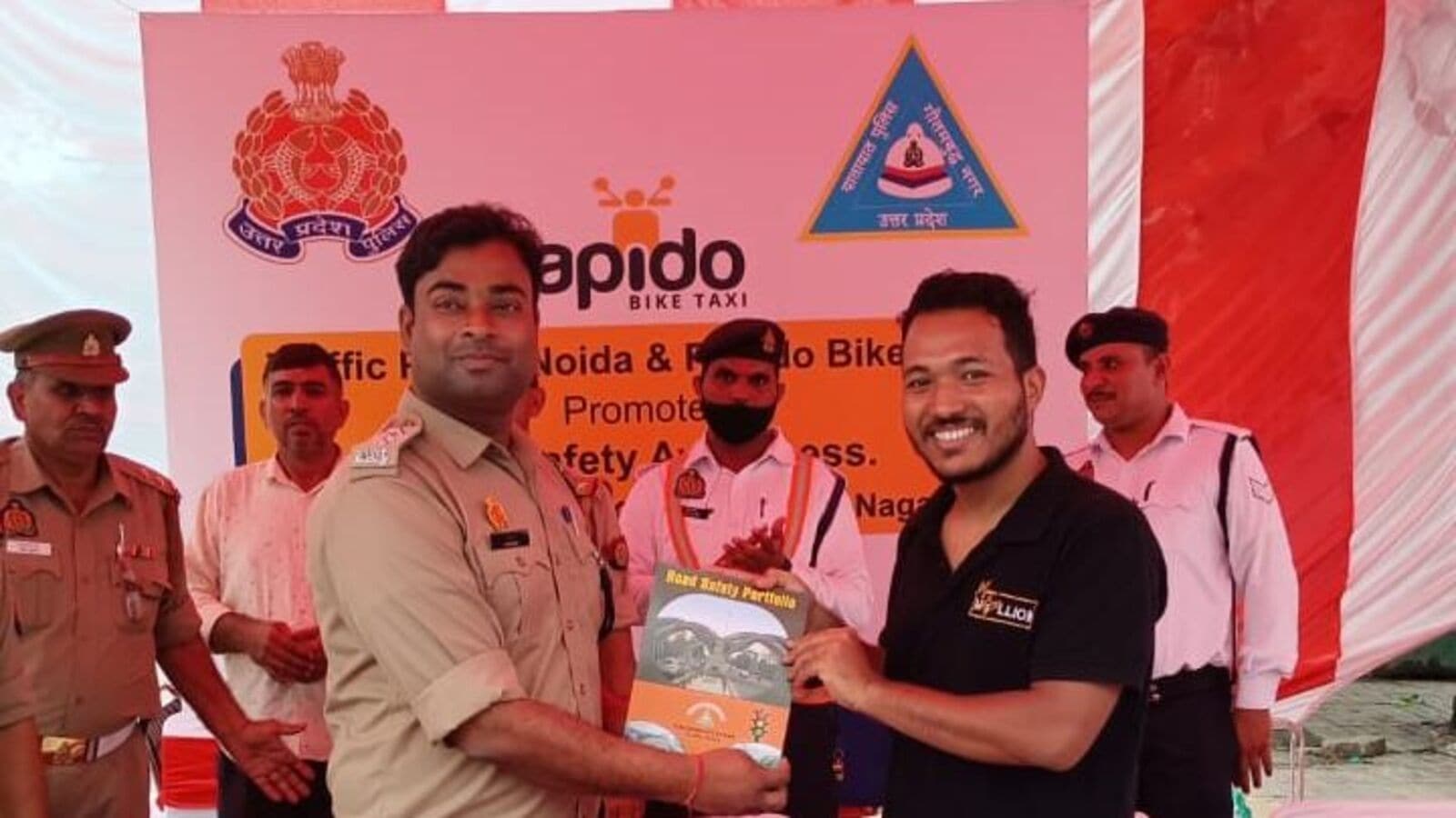 Rapido partners UP Police to distribute over 100 free helmets in Noida