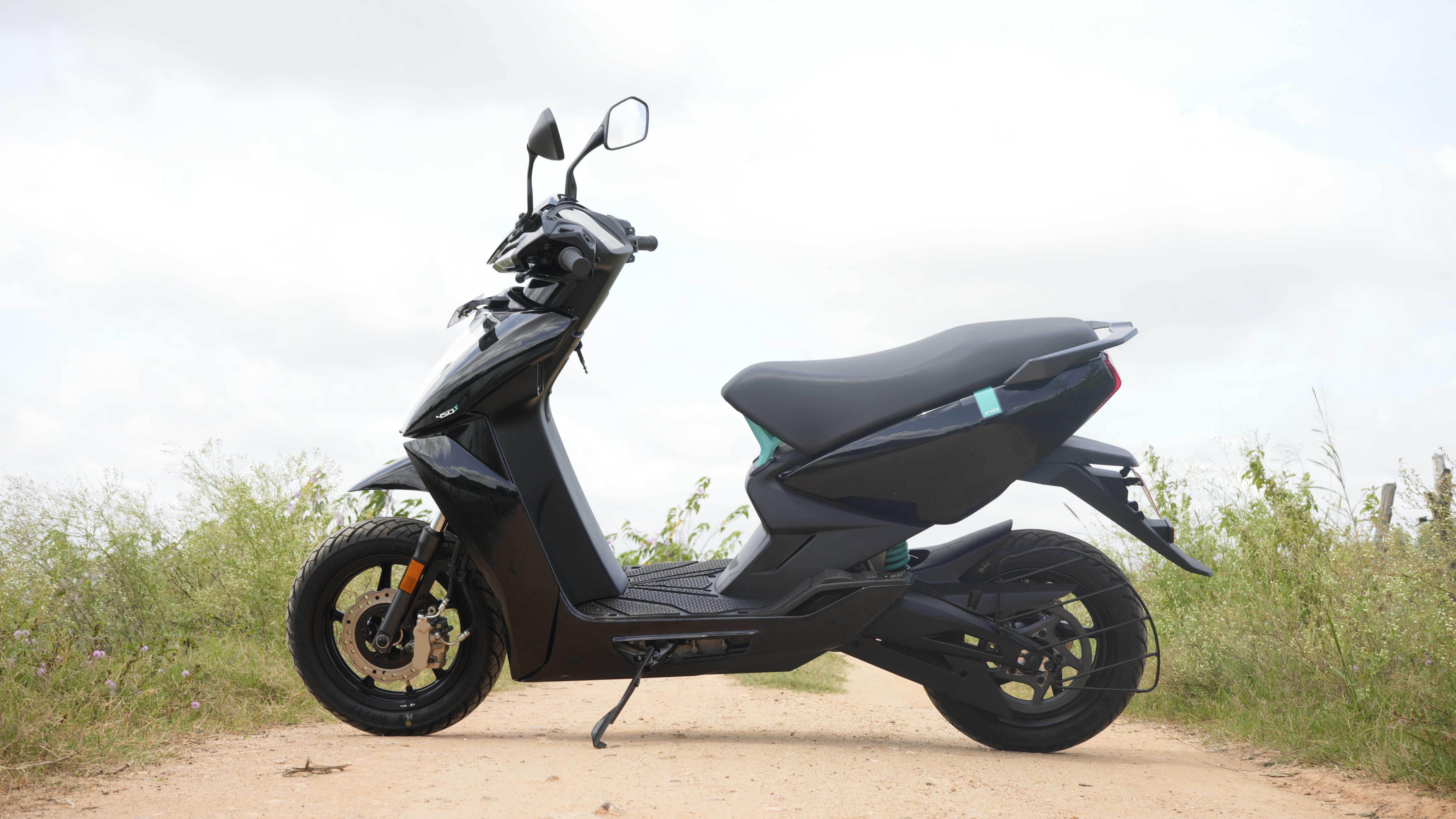 Ather 450S promises to run a 115 km range on a single charge, but the true range is around 90 km and that too depends on road conditions, and riding mode being used.