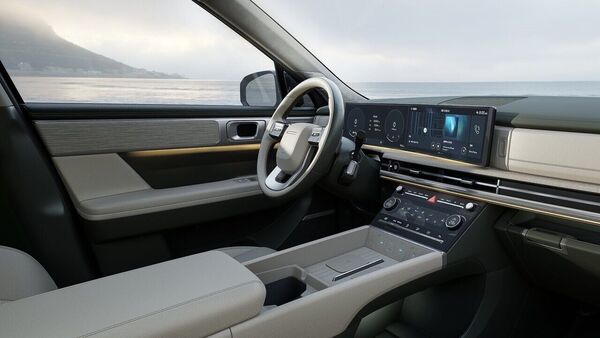 The interior of the Santa Fe is offered in multiple colour options. It comes with three displays - a digital instrument cluster, a touchscreen infotainment system and a screen for climate control. The interior of the Santa Fe is offered in multiple colour options. It comes with three displays - a digital instrument cluster, a touchscreen infotainment system and a screen for climate control.