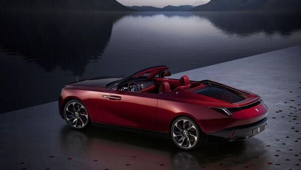 The two-seat roadster comes with a removable hardtop made from carbon fiber and electrochromic glass. The low-slung roof and a sleek exterior make the vehicle look like a high-tech luxury yacht. The two-seat roadster comes with a removable hardtop made from carbon fiber and electrochromic glass. The low-slung roof and a sleek exterior make the vehicle look like a high-tech luxury yacht.