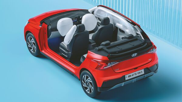 The i20 comes with 26 Standard safety features including 6 Airbags, Electronic Stability Control (ESC), Hill Assist Control (HAC), Vehicle Stability Management (VSM), Antilock Braking System (ABS), and Electronic Brake Distribution (EBD) and much more. The three-point seatbelt with seatbelt reminders for all seats adds an extra layer of security. The i20 comes with 26 Standard safety features including 6 Airbags, Electronic Stability Control (ESC), Hill Assist Control (HAC), Vehicle Stability Management (VSM), Antilock Braking System (ABS), and Electronic Brake Distribution (EBD) and much more. The three-point seatbelt with seatbelt reminders for all seats adds an extra layer of security.