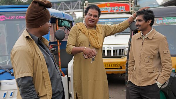 Preethi chats with fellow auto rickshaw drivers as she waits for customers to ferry in her electric auto rickshaw in Bengaluru. Electric vehicles sales are skyrocketing, and experts say it’s crucial that everyone benefits from these big moves toward clean energy. (AP Photo/Aijaz Rahi) Preethi chats with fellow auto rickshaw drivers as she waits for customers to ferry in her electric auto rickshaw in Bengaluru. Electric vehicles sales are skyrocketing, and experts say it’s crucial that everyone benefits from these big moves toward clean energy. (AP Photo/Aijaz Rahi)